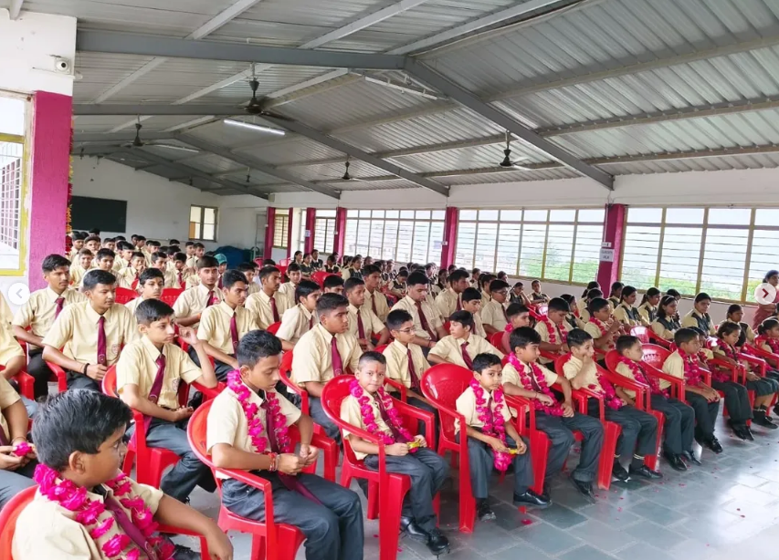 Teacher helping student